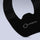 Close-up of a Lifinity black curved wearable belt with the LIFINITY logo printed in white on a light gray background.