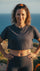 Woman in athletic wear standing outdoors with a scenic background